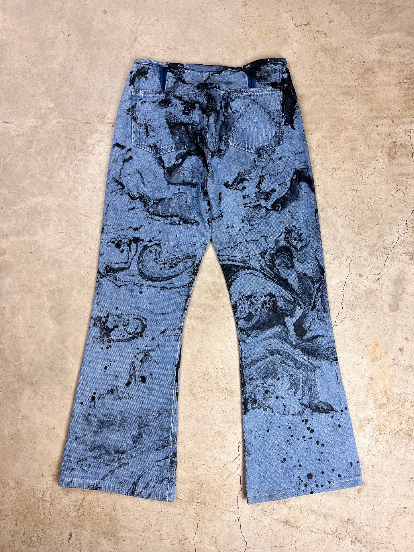 The Marbled Flare Leg Jeans - M